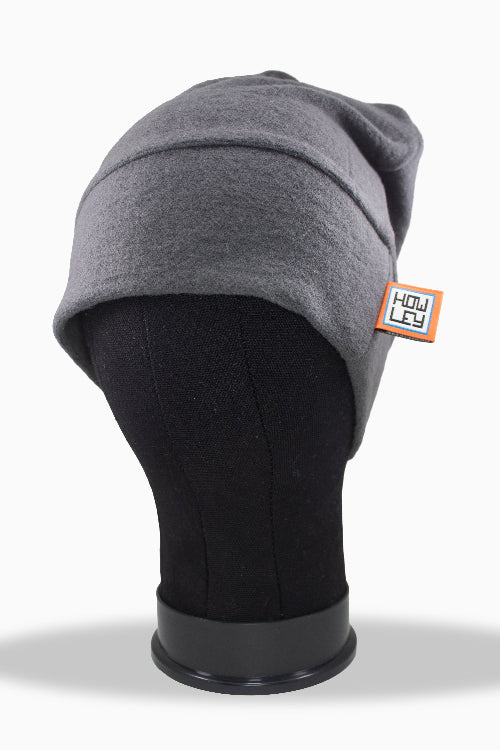 Gray beanie on a black mannequin head with 'HOWLEY' branding tag.